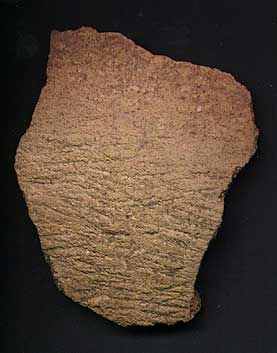 Photo of pottery shard showing cross hatching.