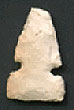 Photo of side notched arrowhead.